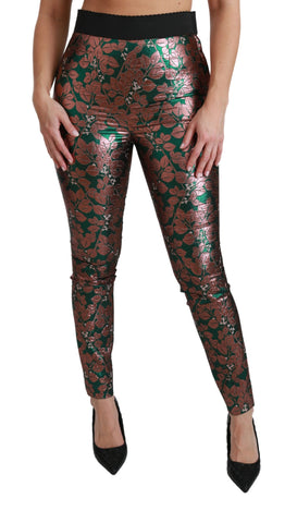 Green bronze leaf pattern skinny tights by Dolce & Gabbana, featuring a detailed leaf design on sheer fabric.