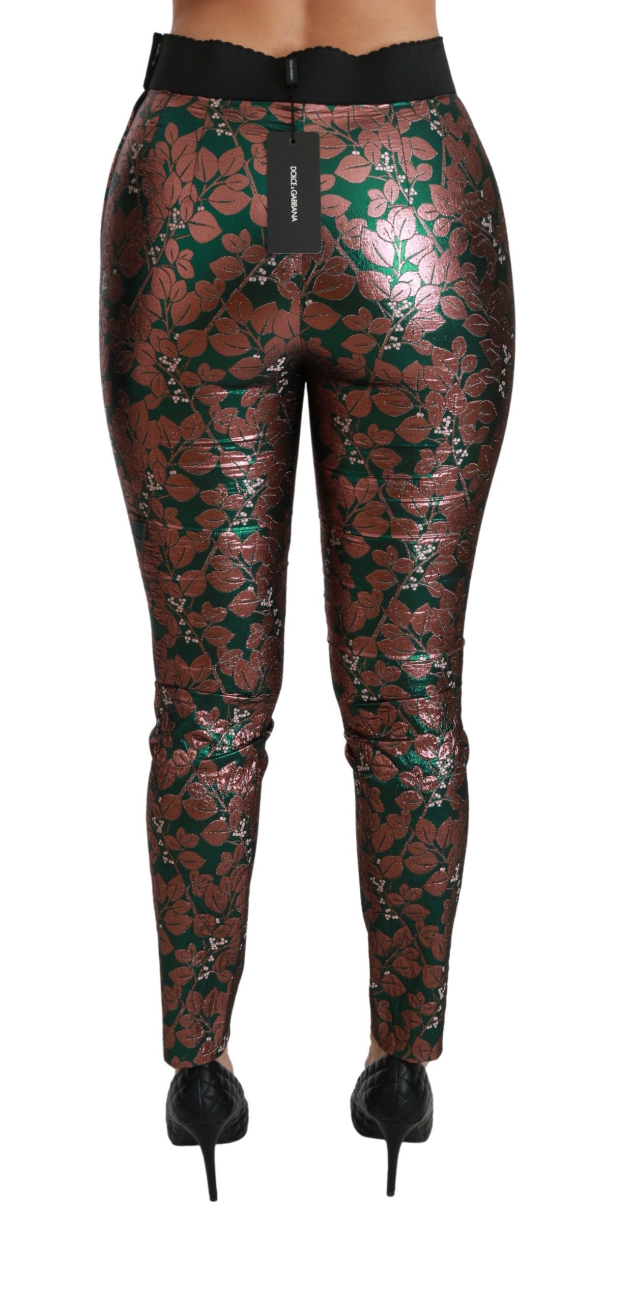 Green bronze leaf pattern tights by Dolce & Gabbana, skinny pants style with intricate leaf design and sleek fit.