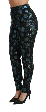 Blue and green floral metallic slim pants by Dolce & Gabbana, featuring a fitted design with vibrant floral patterns.