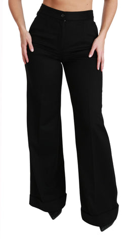 Dolce & Gabbana black wide-leg flared cashmere trousers displayed on a model.