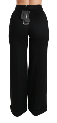 Black wide-leg flared cashmere trousers by Dolce & Gabbana, featuring a relaxed fit and smooth fabric, shown in the image.
