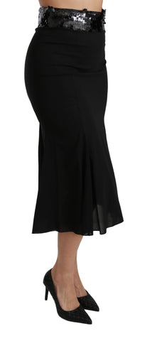 Black high waist mermaid midi silk skirt by Dolce & Gabbana, featuring a fitted design and elegant flowy hem.