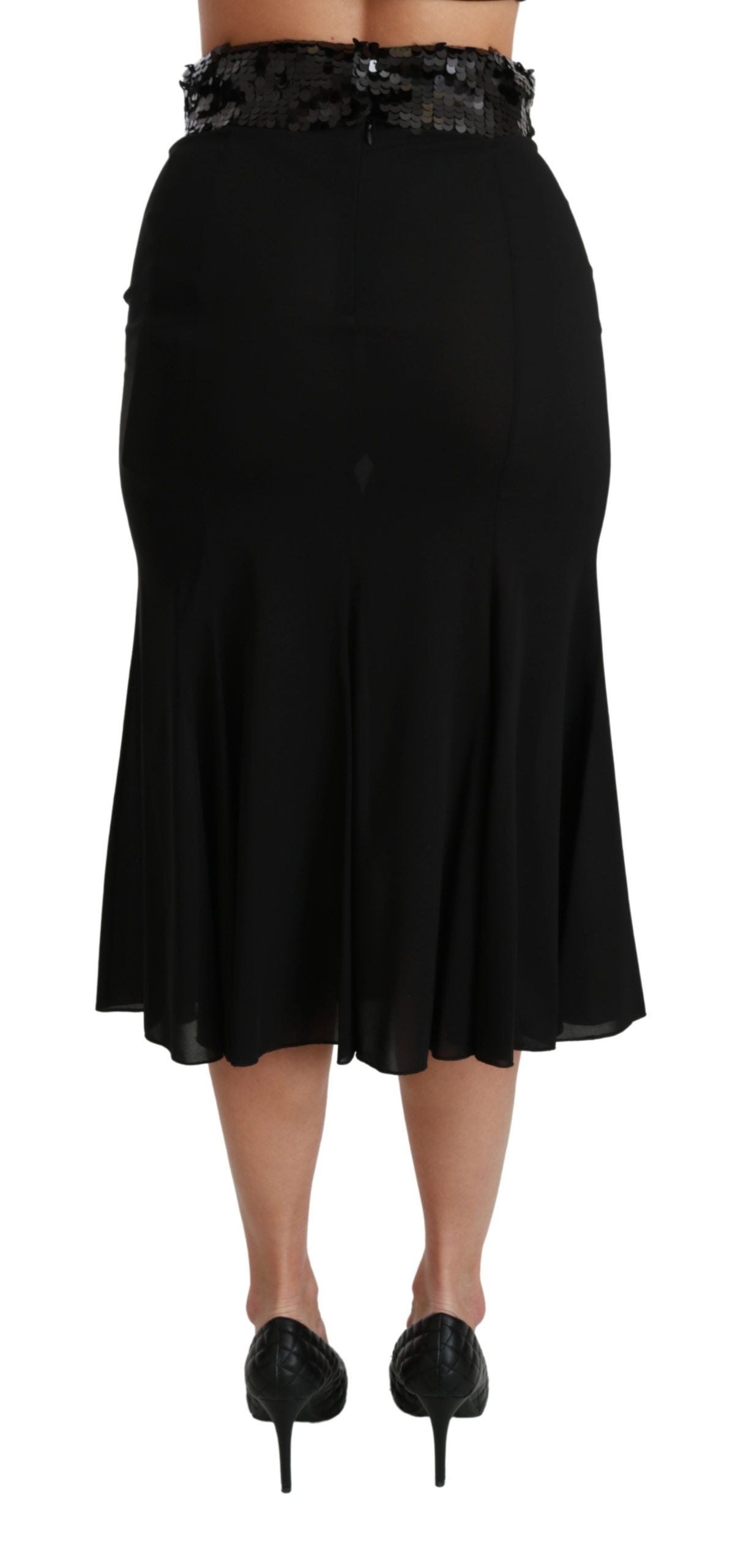 Black high waist mermaid midi silk skirt by Dolce & Gabbana, showcasing a fitted silhouette and elegant flowing fabric.
