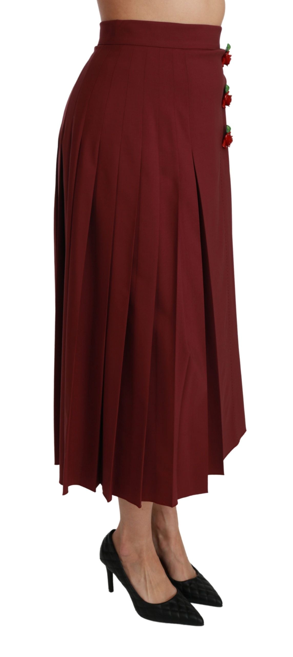 Red high waist pleated maxi wool skirt by Dolce & Gabbana, shown hanging with detailed pleats and tailored fit.