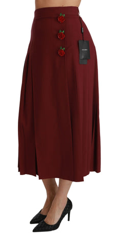 Red high waist pleated maxi wool skirt by Dolce & Gabbana, showcasing elegant pleats and a flowing design.