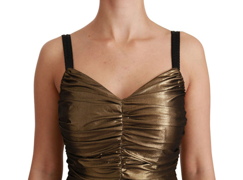 Gold metallic stretch bodycon ruched dress by Dolce & Gabbana, form-fitting with ruching details and a sleek, shiny finish.