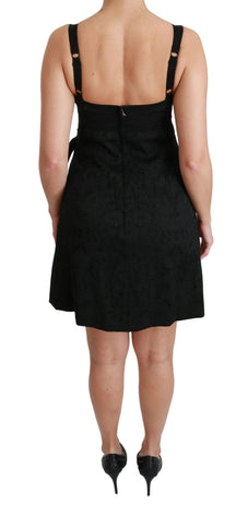 Black stretch satin jacquard mini dress by Dolce & Gabbana, featuring a fitted silhouette and elegant design.