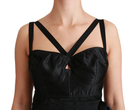 Black stretch satin jacquard mini dress by Dolce & Gabbana, featuring a fitted silhouette and intricate pattern details.