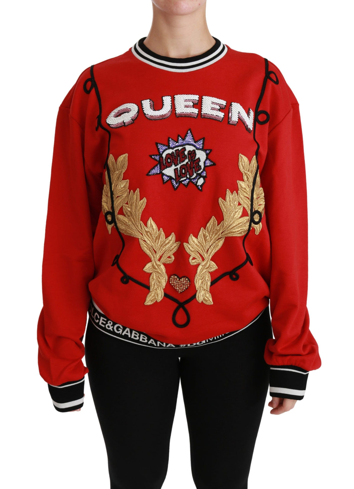 Red sequined Love pullover sweater by Dolce & Gabbana featuring sparkling sequin embellishments and a cozy knit design.