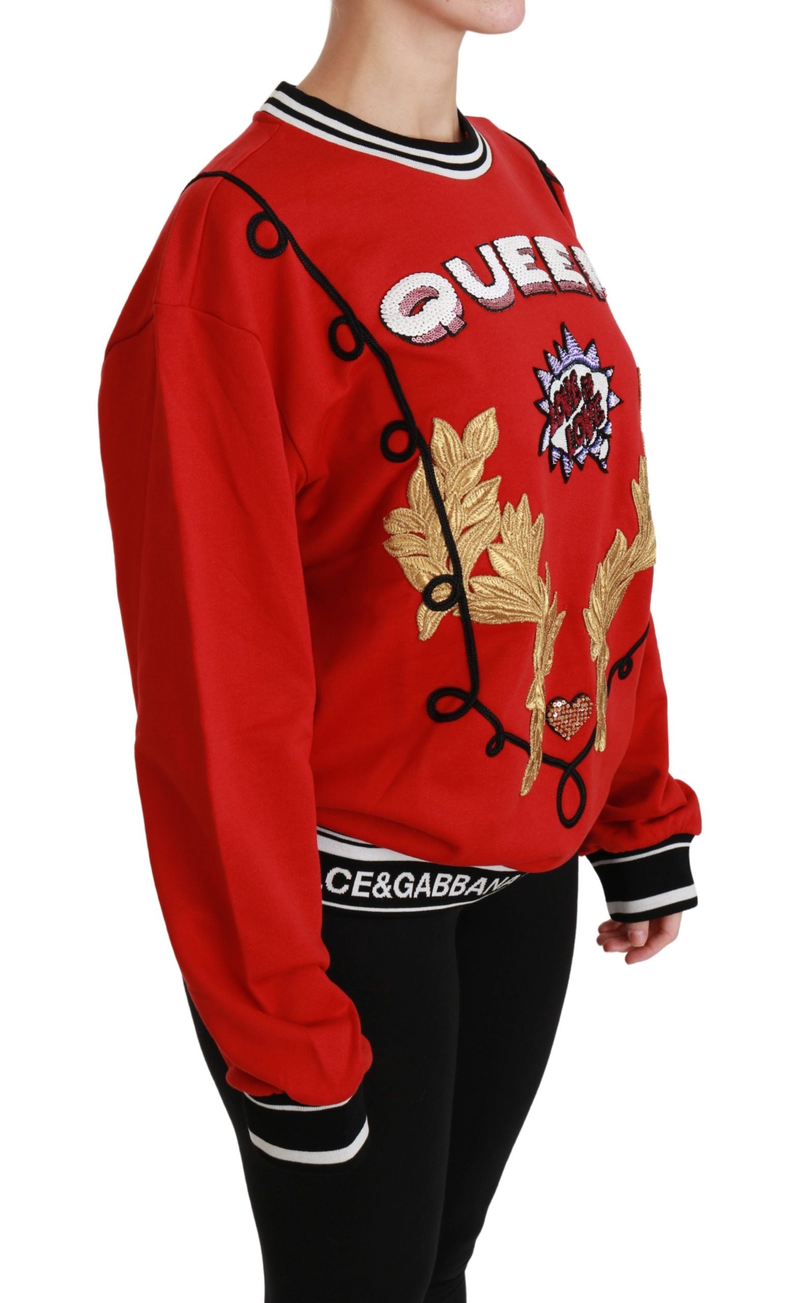 Red Queen sequined love pullover sweater by Dolce & Gabbana with shimmering sequins and a bold, vibrant design.
