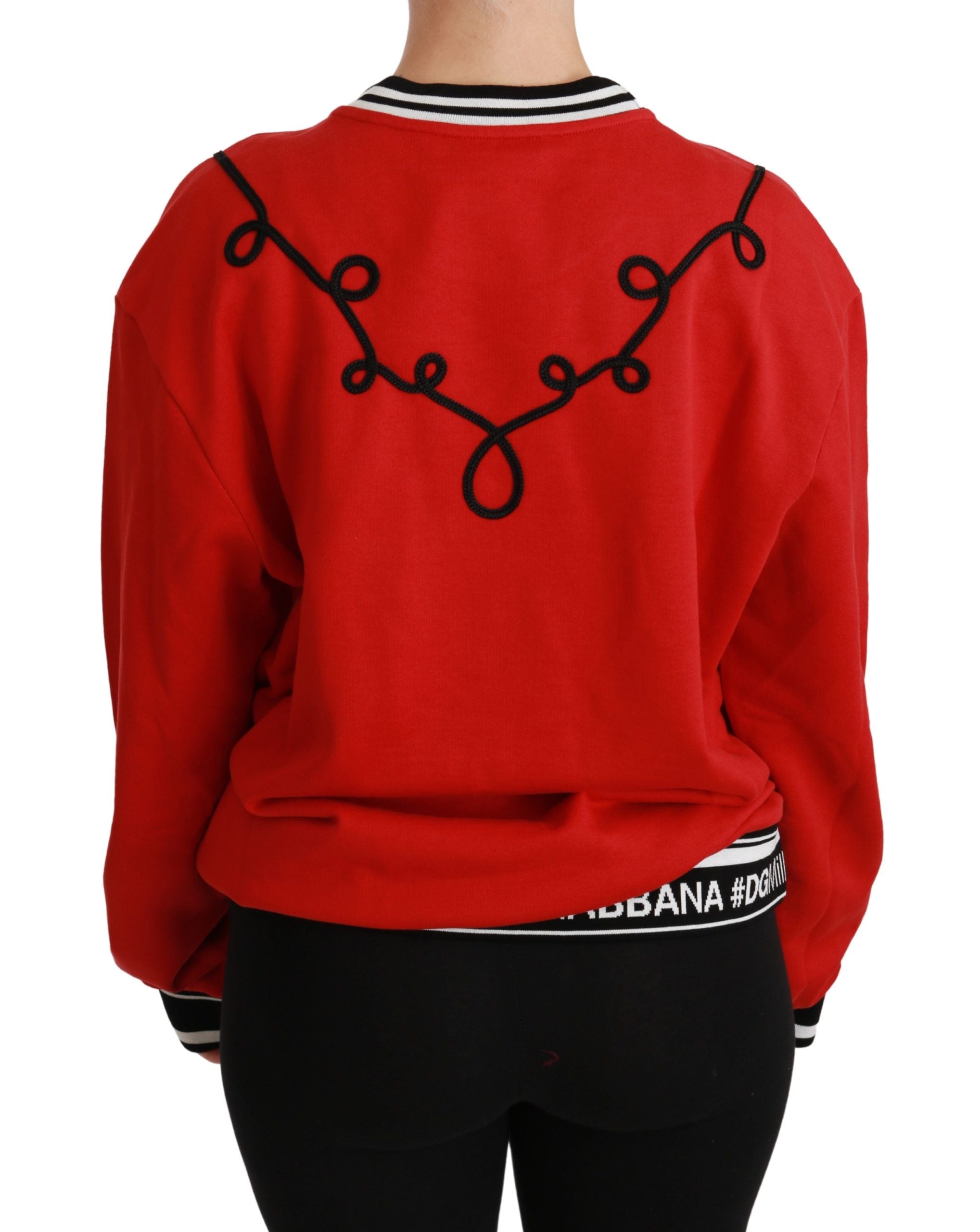 Red sequined love pullover sweater by Dolce & Gabbana with a sparkling, embellished design and a cozy fit.