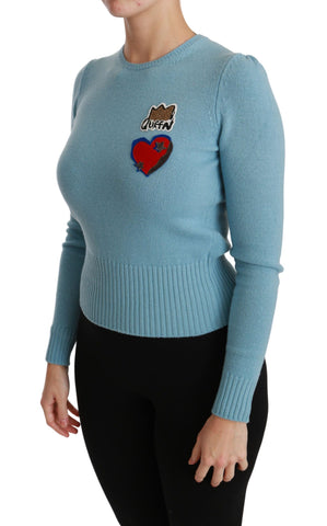 Blue wool queen heart pullover sweater by Dolce & Gabbana, featuring a cozy knit with a heart design on the front.