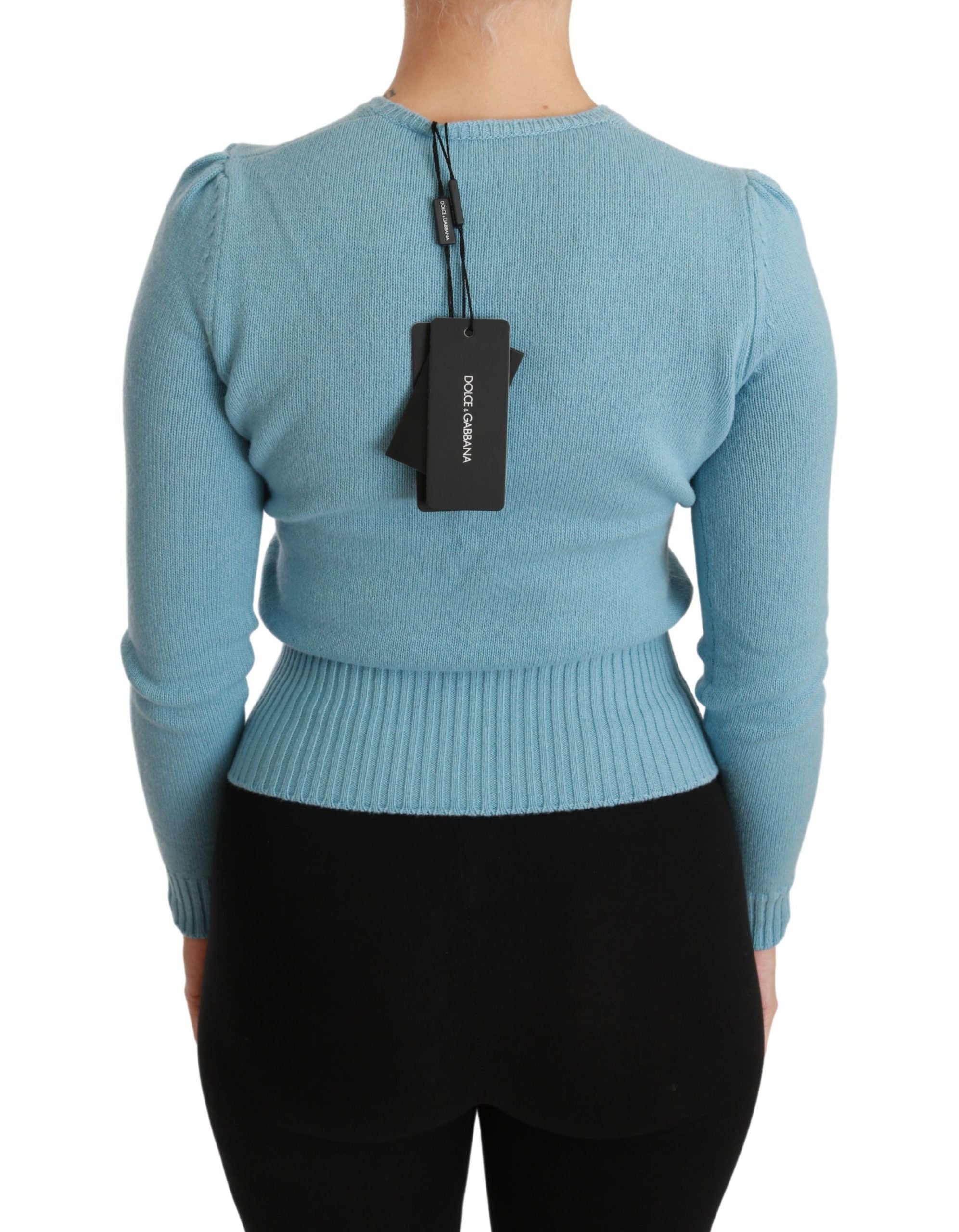 Blue wool queen heart pullover sweater by Dolce & Gabbana, featuring a cozy fit with a distinctive heart design.