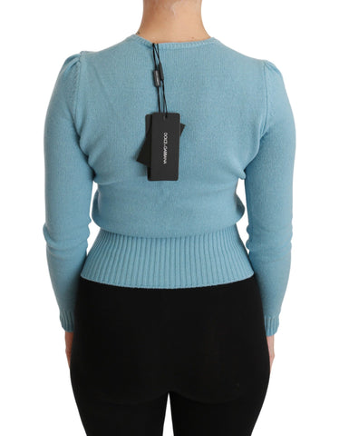 Blue wool queen heart pullover sweater by Dolce & Gabbana, featuring a cozy fit with a distinctive heart design.