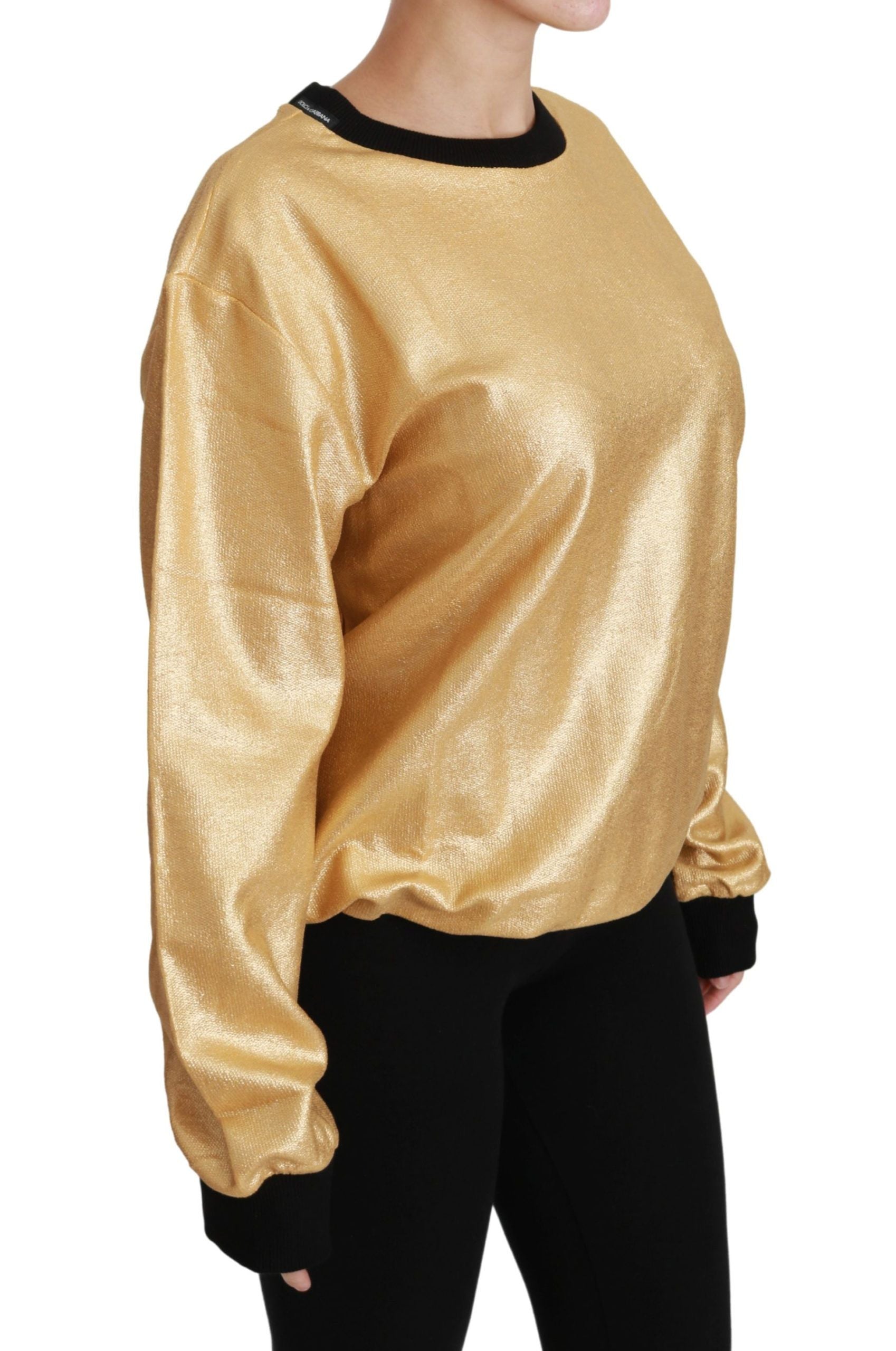 Gold cotton crewneck pullover sweater by Dolce & Gabbana, showing the detailed knit fabric and classic fit.