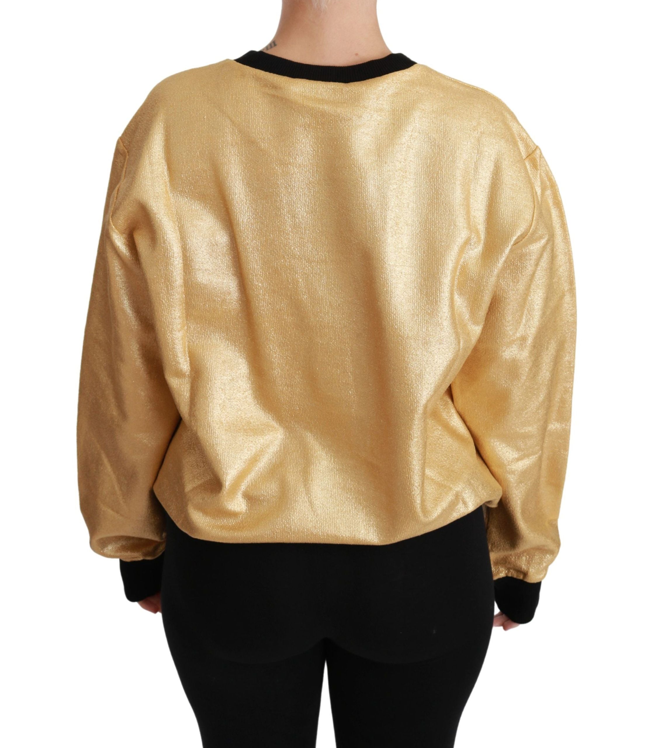 Gold cotton crewneck pullover sweater by Dolce & Gabbana, showcasing a relaxed fit with ribbed cuffs and neckline.