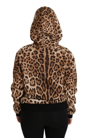Brown hooded Dolce & Gabbana leopard sweater with studded accents and a stylish fit, featuring a cozy hood and bold animal print.