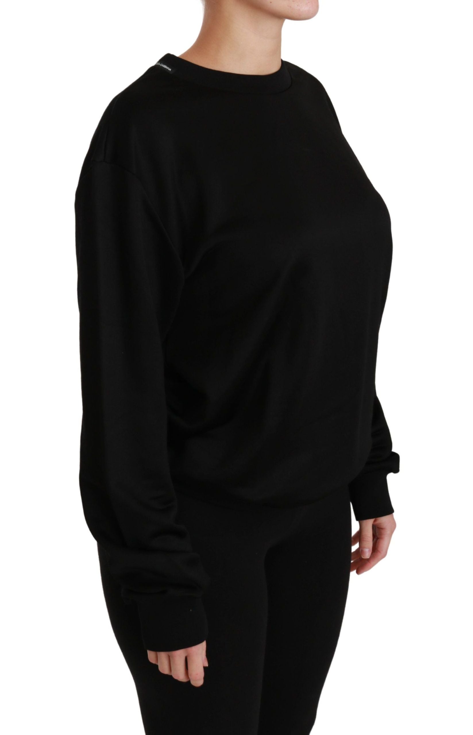 Black cotton crewneck pullover sweater by Dolce & Gabbana, featuring a classic fit and smooth fabric texture.