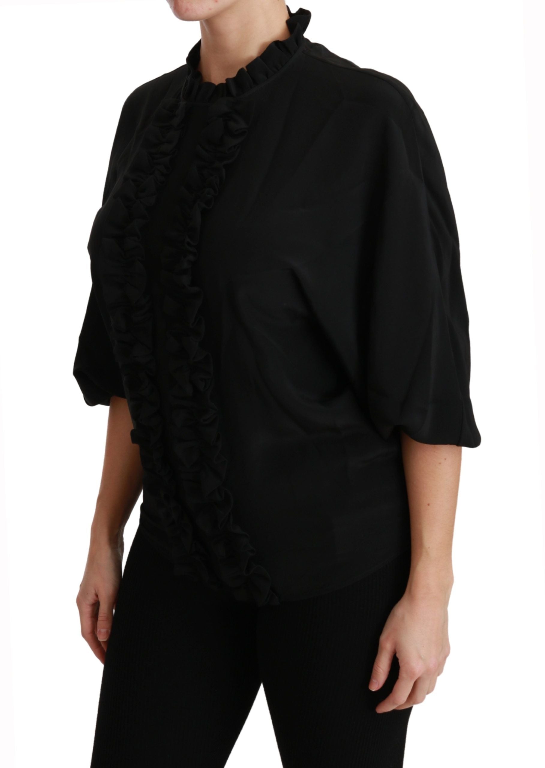 Black silk ruffled blouse by Dolce & Gabbana, featuring a stylish, elegant shirt with feminine ruffle details.