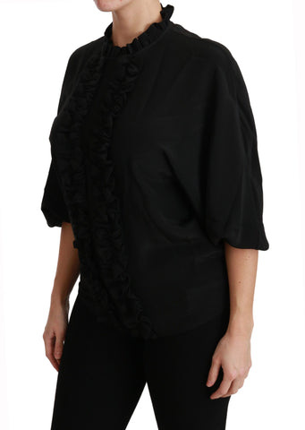 Black silk ruffled blouse by Dolce & Gabbana, featuring a stylish, elegant shirt with feminine ruffle details.