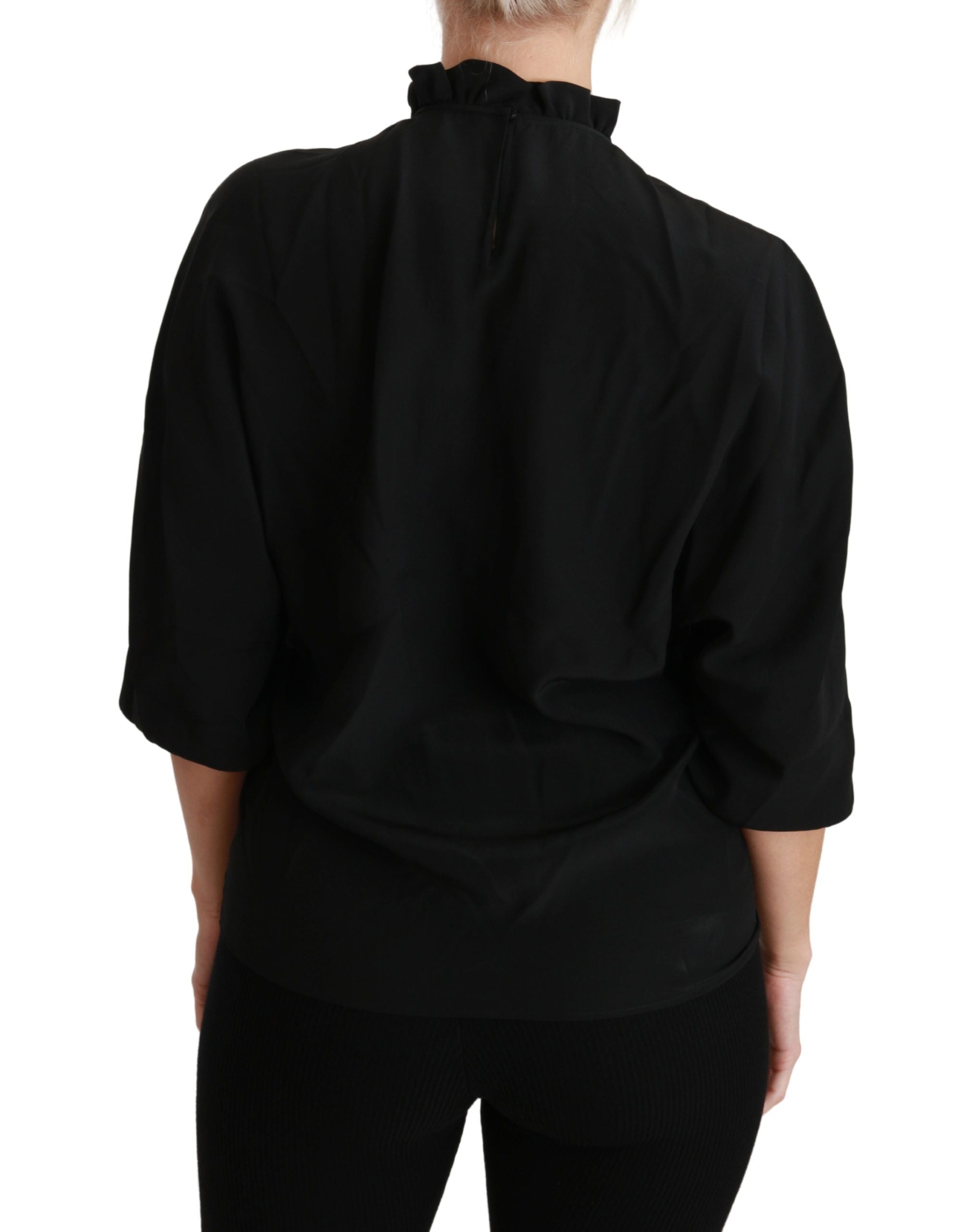 Black silk ruffled top blouse by Dolce & Gabbana featuring a stylish, elegant design with ruffle details.