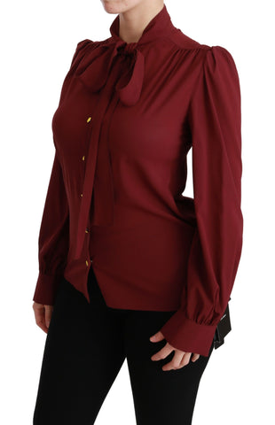 Maroon silk long sleeve blouse by Dolce & Gabbana, featuring a stylish, fitted shirt with classic collar and elegant design.