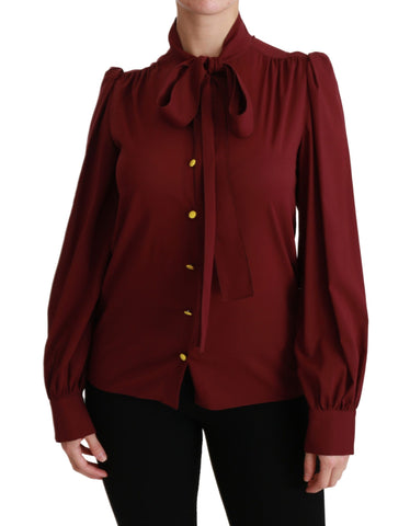 Maroon silk long sleeve shirt blouse by Dolce & Gabbana, featuring a stylish and elegant design with a fitted silhouette.