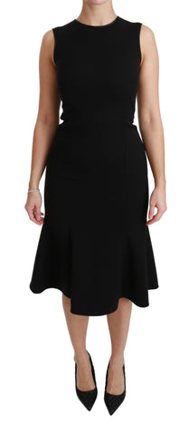Black fit flare wool stretch sheath dress by Dolce & Gabbana, featuring a tailored silhouette and classic design.