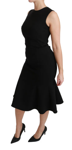 Black fit flare wool stretch sheath dress by Dolce & Gabbana, showcasing a tailored silhouette and elegant design.