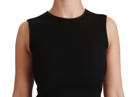 Black fit flare wool stretch sheath dress by Dolce & Gabbana, shown on a mannequin, close-up of tailored fit and elegant design.