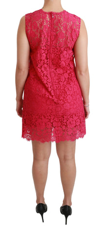 Pink floral lace shift mini dress by Dolce & Gabbana with delicate lace details and a fitted silhouette.