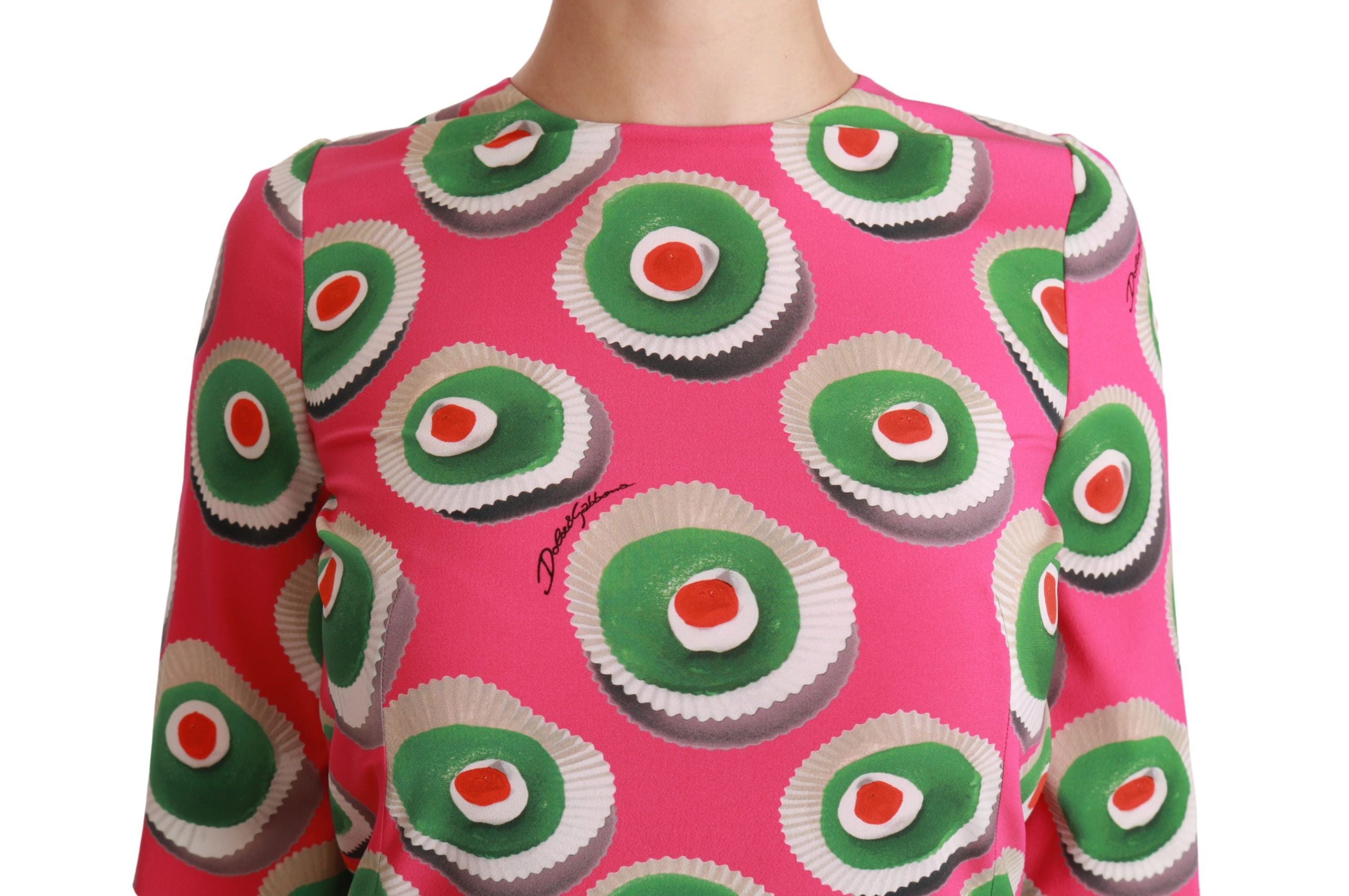 Pink silk cupcake shift dress by Dolce & Gabbana, featuring a fitted sleeveless design and elegant stretch fabric.