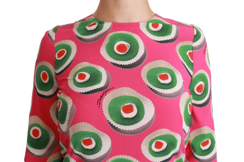 Pink silk cupcake shift dress by Dolce & Gabbana, featuring a fitted sleeveless design and elegant stretch fabric.