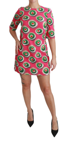 Pink silk Dolce & Gabbana shift dress with a fitted silhouette and elegant cupcake-inspired design.