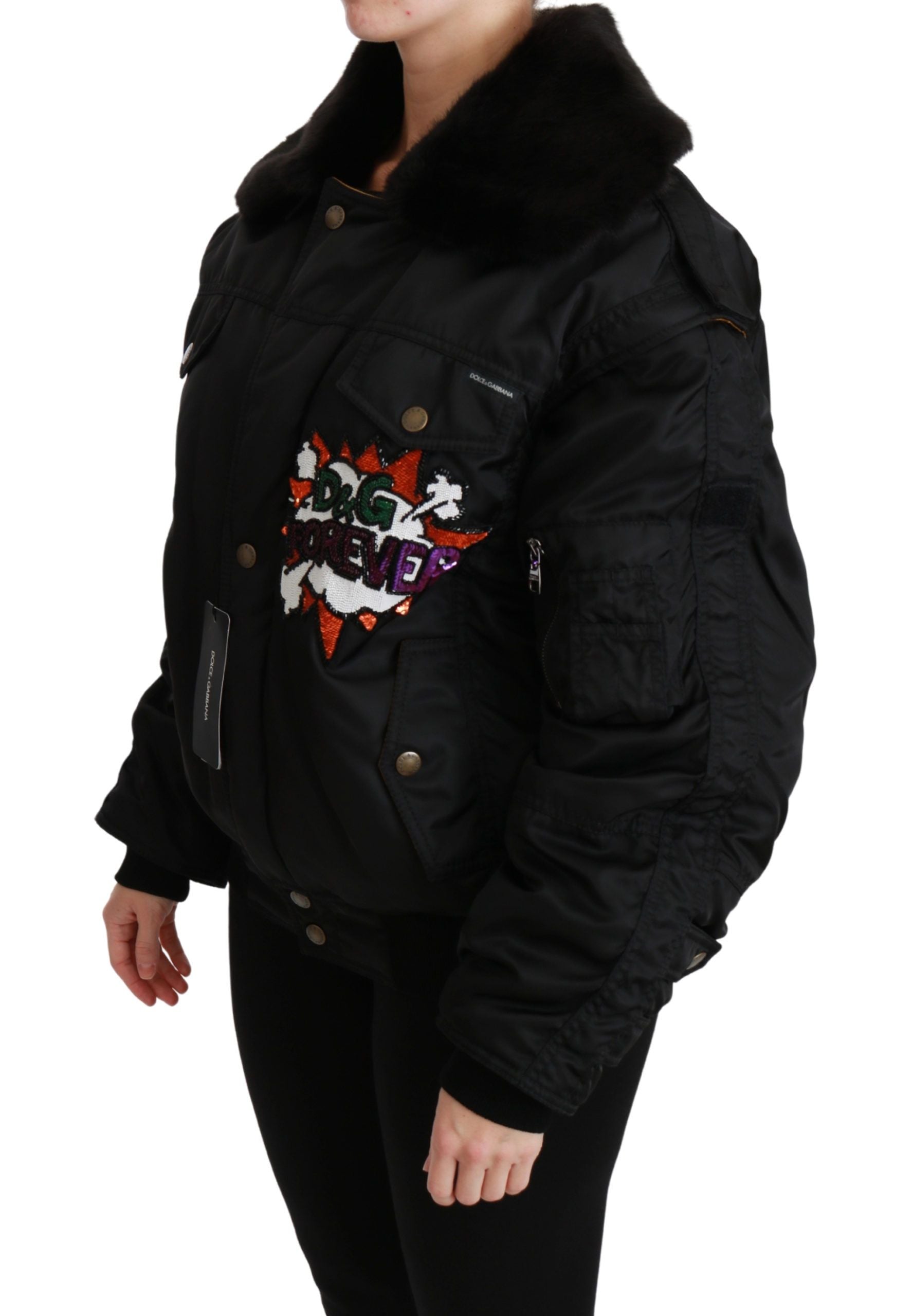 Black sequined bomber jacket with queen crown embroidery by Dolce & Gabbana, featuring a stylish, shiny design and fitted silhouette.