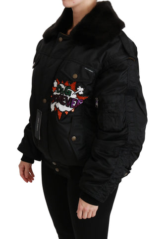 Black sequined bomber jacket with queen crown embroidery by Dolce & Gabbana, featuring a stylish, shiny design and fitted silhouette.