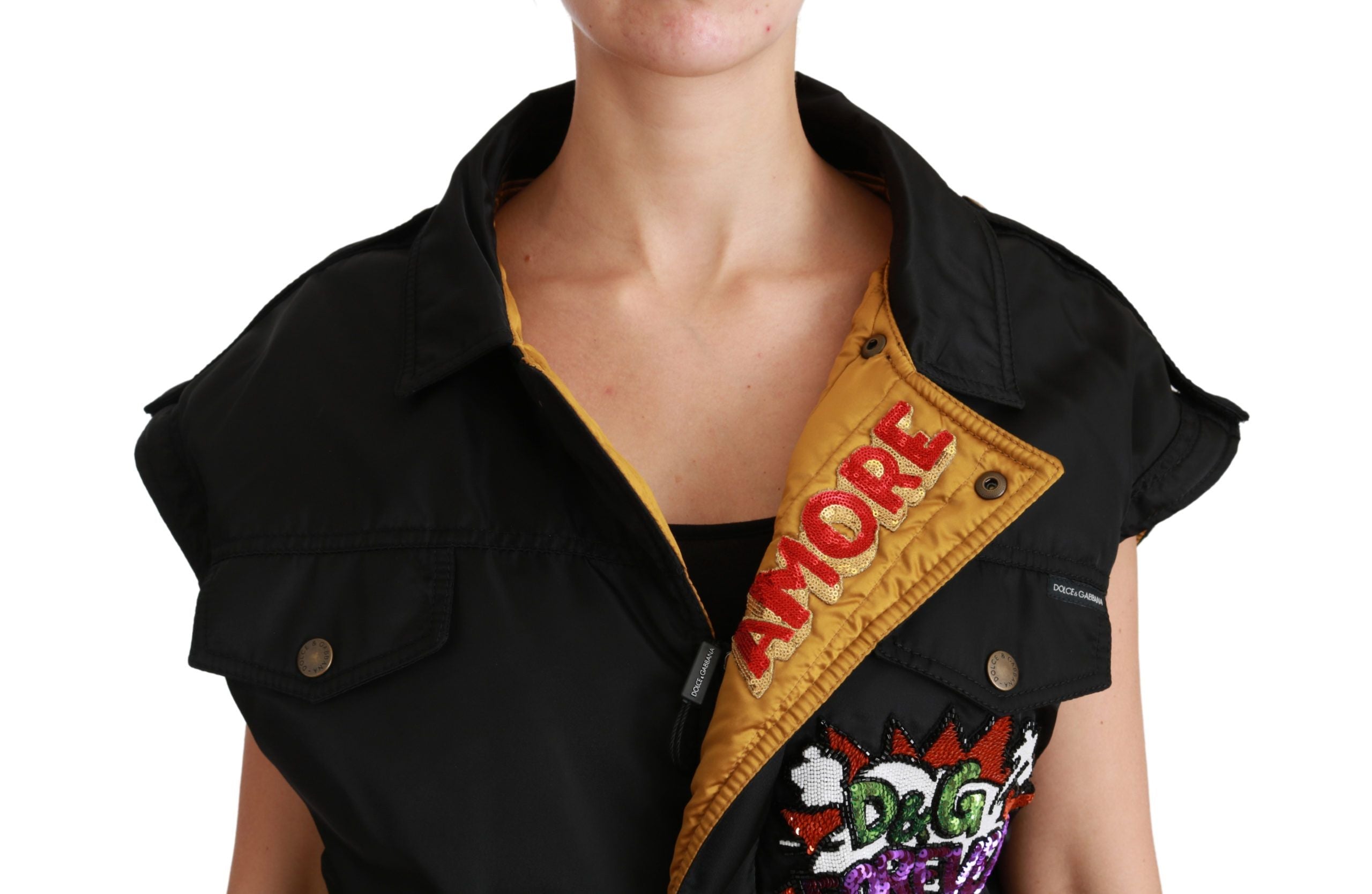 Black sequined bomber jacket with queen crown design by Dolce & Gabbana, featuring shiny embellishments and a stylish fit.