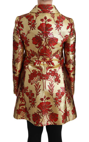 Red gold floral brocade cape coat jacket by Dolce & Gabbana, featuring ornate floral patterns and luxurious fabric details.