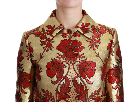 Red gold floral brocade cape coat jacket by Dolce & Gabbana with intricate embroidery and luxurious fabric detail.