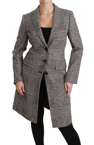 Multicolor long trench coat by Dolce & Gabbana, knee-length jacket with vibrant color block design and classic collar.
