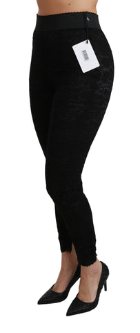 Black lace skinny high waist cotton pants by Dolce & Gabbana, showcasing their fitted silhouette and intricate lace detailing.