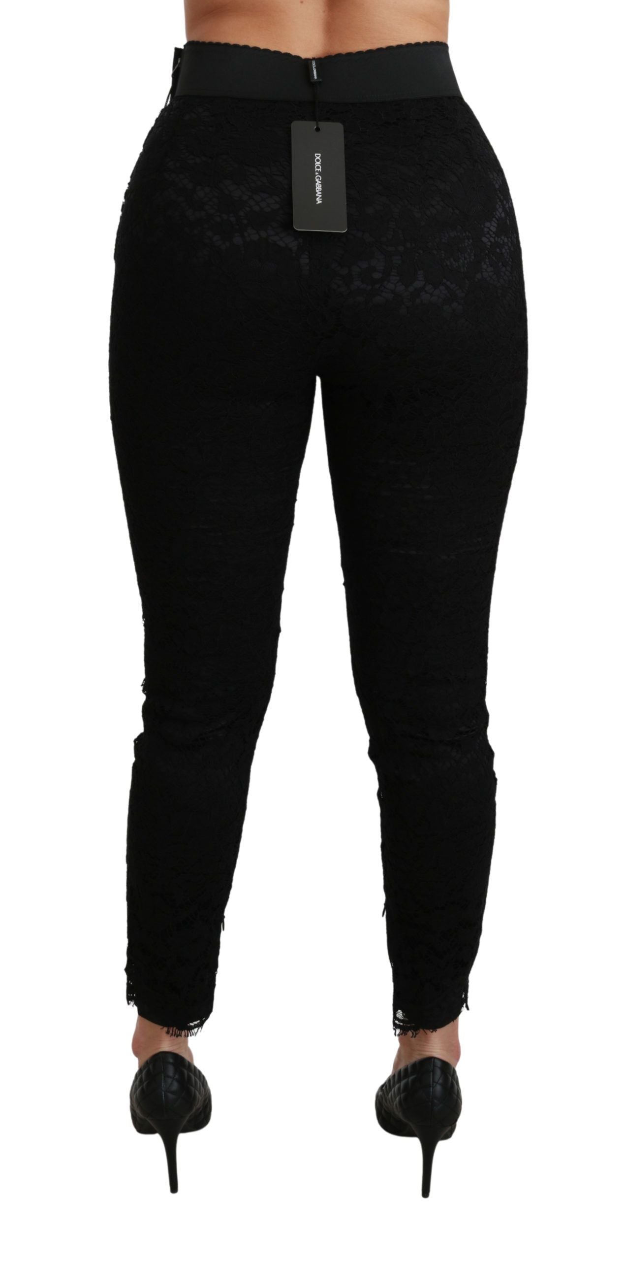Black lace skinny high waist cotton pants by Dolce & Gabbana, close-up showing intricate lace details and fitted style.