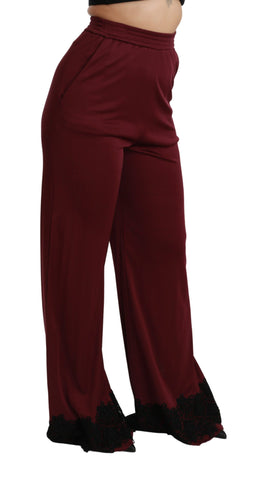 Black lace high waist wide-leg maroon pants by Dolce & Gabbana, featuring intricate lace details and flowing wide-leg style.