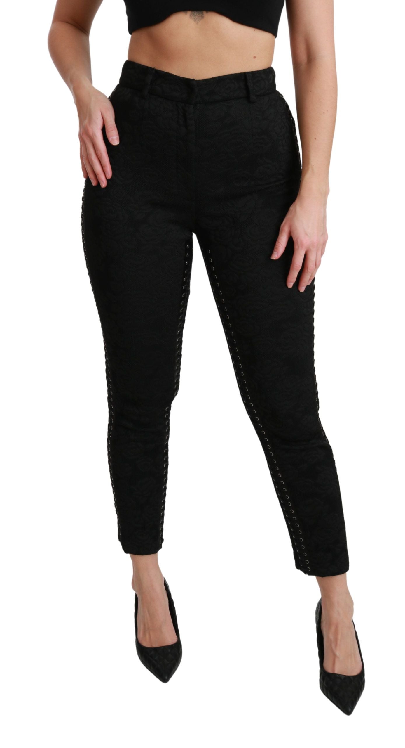 Black brocade skinny high-waist pants by Dolce & Gabbana, featuring intricate pattern and tailored fit.