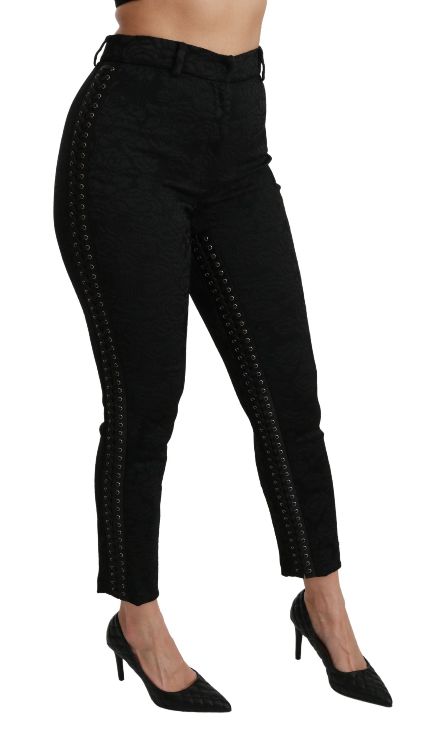 Black brocade skinny high-waist pants by Dolce & Gabbana, showcasing intricate fabric details and sleek fit.