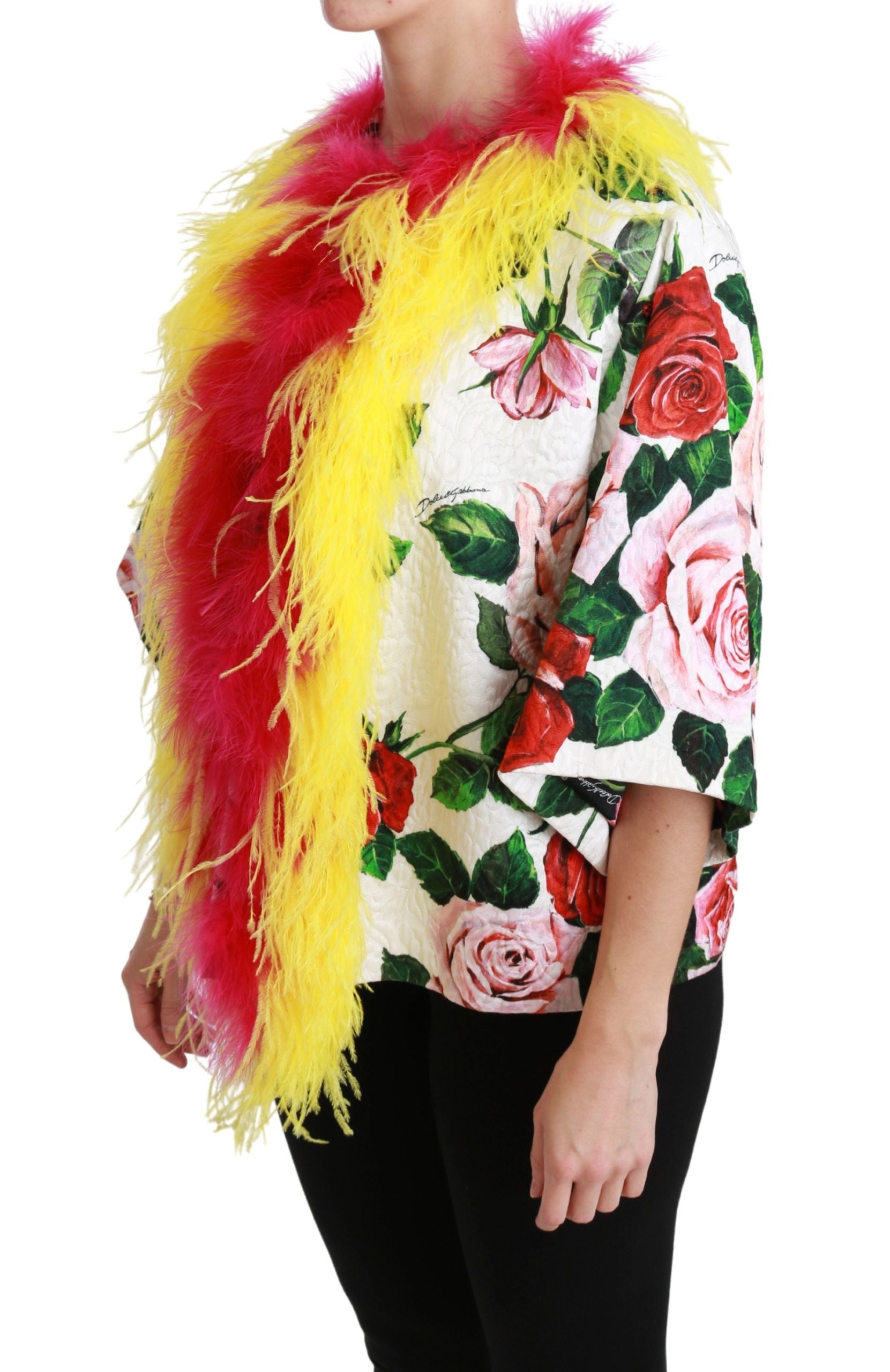 White floral coat with fur roses by Dolce & Gabbana, featuring intricate floral embroidery and luxurious fur accents.