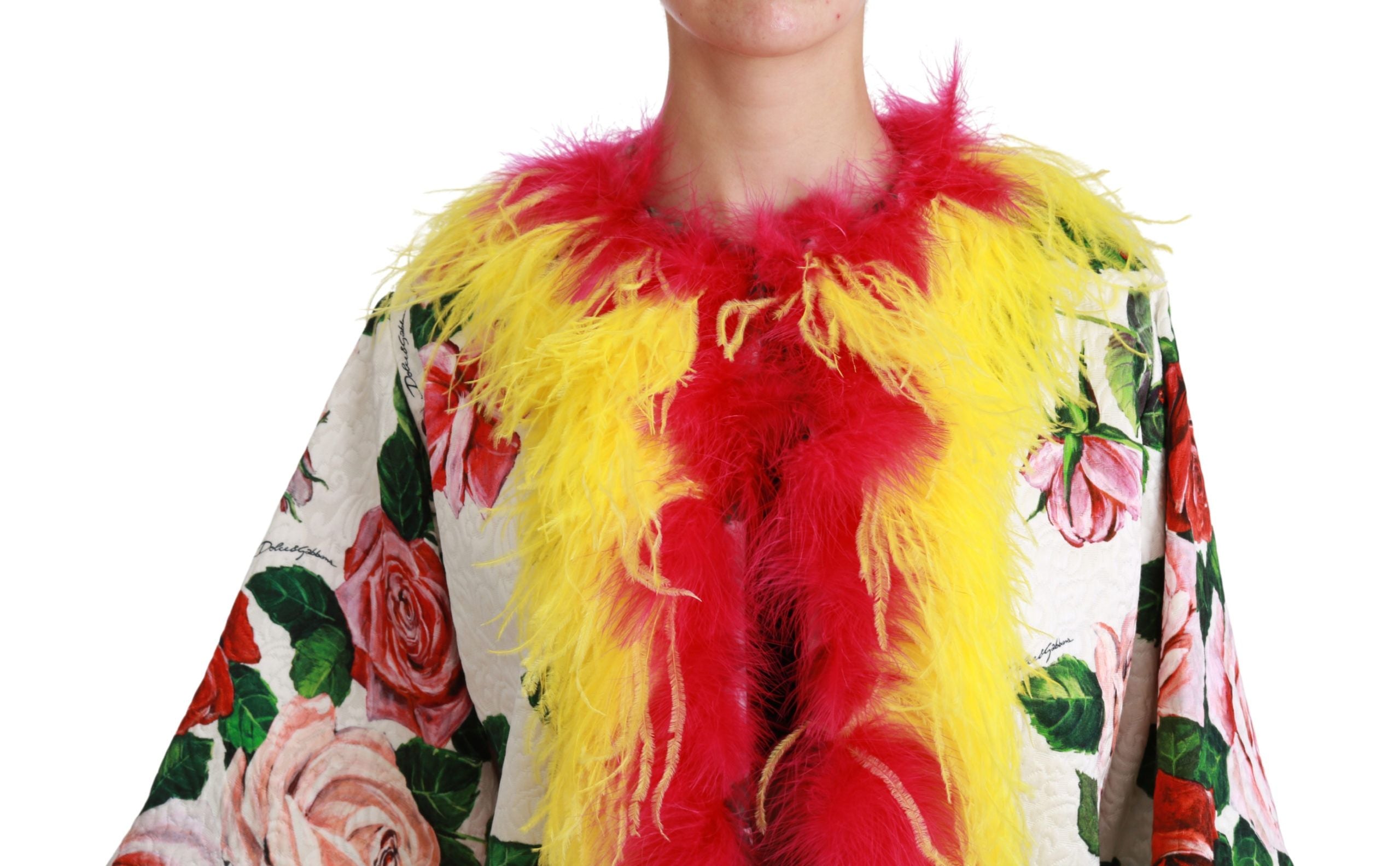 White floral coat with fur roses by Dolce & Gabbana, showcasing intricate floral embroidery and luxurious fur details.