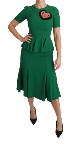 Green mermaid midi dress with heart patch details by Dolce & Gabbana, featuring a flowy viscose fabric and fitted silhouette.