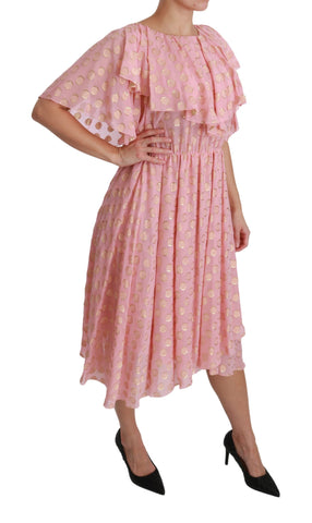 Pink silk pleated A-line midi dress with polka dots by Dolce & Gabbana, featuring a flowing, elegant design.