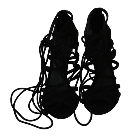 Black suede strap stilettos sandals by Dolce & Gabbana with sleek high heels and elegant design.